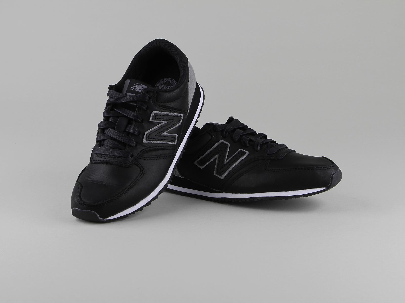 new balance cuir noir et or